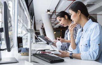 women-working-hard-together-innovation-office